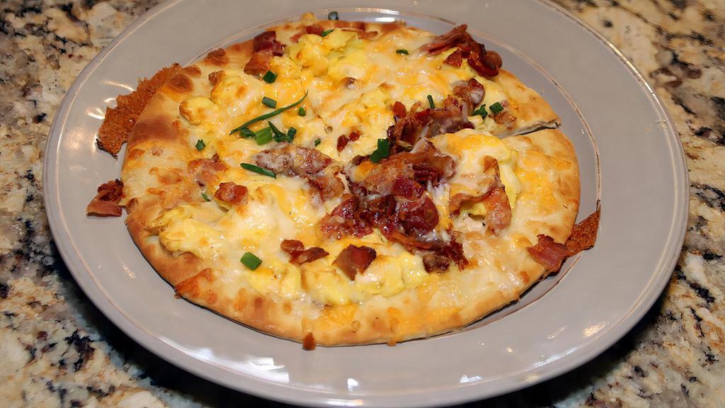 Breakfast Pizza · 2 scrambled eggs/cheddar cheese crispy applewood smoked bacon