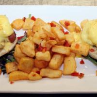 Eggs Benedict Pancetta · a pair of English muffins topped with poached eggs/hollandaise sauce/crispy imported Italian...