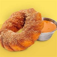 Churro Doughnut · Cinnamon sugar dusted churro doughnut with dulce de leche