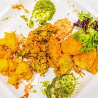 Veg Pakora · Vegetarian. Vegan. Must Try. Medium spiced vegetable fritters made with onion, potato, spina...
