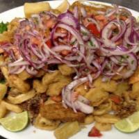 Jalea · Fried seafood with salsa criolla and fried yuca.