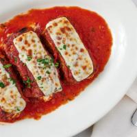 Eggplant Rollentini (3 Pc) · Topped with mozzarella and baked.