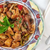 Chicken Scarpariello · Sausage ,potatoes,  mushrooms, onions and peppers in a brown sauce.