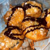 Classic Fried Oreos · 5 pieces of Original Oreos dipped in pancake batter & deep fried to golden brown perfection....