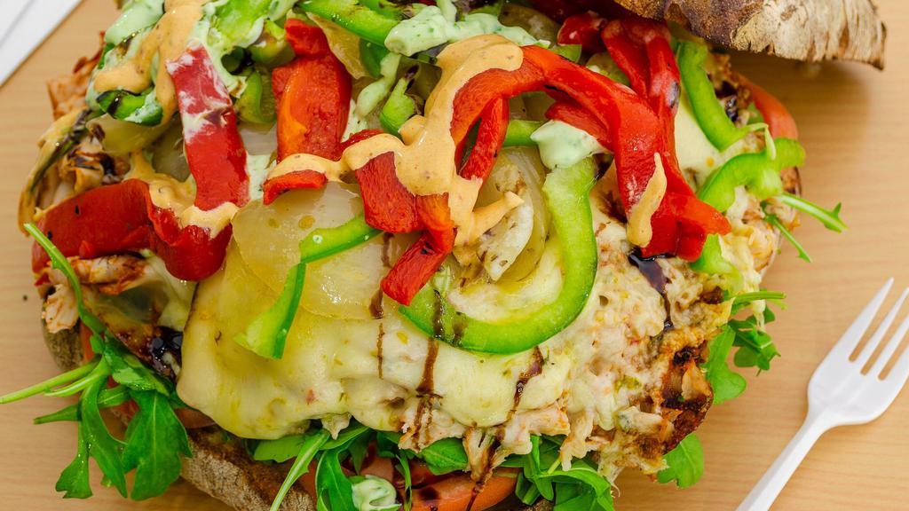 El Paso Chicken Sandwich · Roasted chicken breast with roasted red, green peppers, sautéed onions, pepper jack cheese, lettuce, tomatoes and southwestern chipotle sauce on country rustic roll.