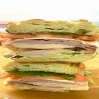 Grilled Chicken Sandwich · Prosciutto cotto, fresh mozzarella avocado, tomato and basil.