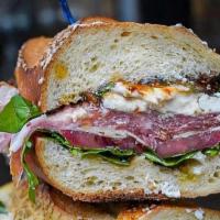 Prosciutto, Burrata With Fig Jam · Shaved Parmigiano, arugula, tomato, olive oil with balsamic glaze with basil