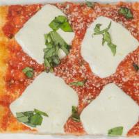 Margherita Pizza · Thin crust with plum tomatoes, fresh mozzarella and basil.