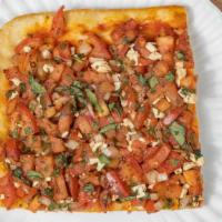 Bruschetta Pizza · Diced tomatoes, fresh mozzarella and onions marinated in garlic, oil and balsamic vinegar on...
