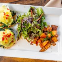 Eggs Florentine · Served with spinach, home fries, and salad.