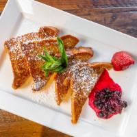 French Toast · Served with strawberry compote, maple syrup, and whipped cream.