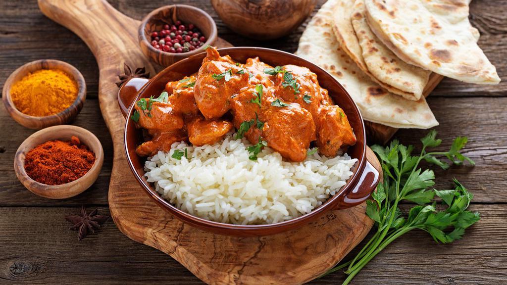 Chicken Tikka Masala · Chunks of roasted marinated chicken in a spiced curry sauce.