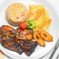Kingston Jerk Chicken · Chicken marinated in jerk season and Jamaican spices slowed cooked on the grill for that spi...
