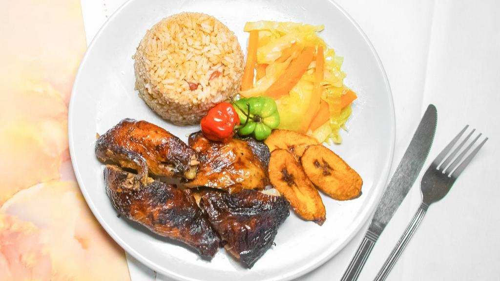 Kingston Jerk Chicken · Chicken marinated in jerk season and Jamaican spices slowed cooked on the grill for that spicy, smoky, sensational savory taste.