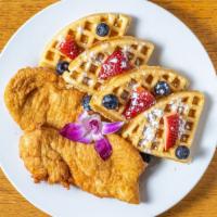 Festive Fried Tomatoes & Vegan Waffles Or Pancakes · Ripe tomatoes seasoned and dip in special batter then fried paired with vegan waffles topped...