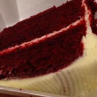 Red Velvet Cake · 2 layers of moist crimson colored chocolate cake topped with homemade cream cheese frosting....