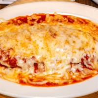 Chefs Chicken Parmigiana · Lightly Breaded Chicken Breast with Fresh Plum Tomato Sauce Topped with Mozzarella.