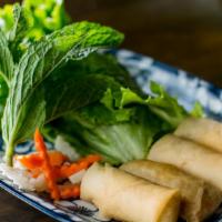 Cha Gio · Fried spring rolls filled with shrimp, crab and pork. Served with fish sauce.