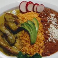 Costillas De Puerco En Salsa Verde O Rojo · Pork ribs in green or red sauce.