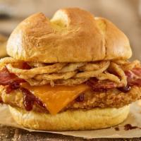 Crispy Bbq Bacon Cheddar Smash · Crispy chicken breast, BBQ sauce, applewood smoked bacon, cheddar and haystack onions on a t...