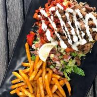 Mixed Over Rice · Chicken and Lamb, served over brown basmati rice with a choice of seasoned fries and diced m...