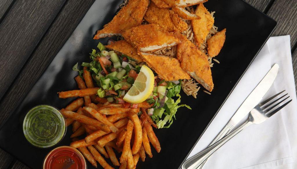 Fried Fish Over Rice · Fried Fish cut up. Served over brown basmati rice with a choice of seasoned fries and diced mixed salad or hummus and diced mixed salad.