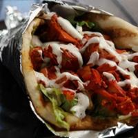 Chicken Gyro · Served on a pita bread with a choice of diced mixed salad and sauces.