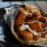 Fried Fish Gyro · Served on a pita bread with a choice of diced mixed salad and sauces.