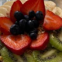 Yellow Acai Bowl · Blended peach, pineapple. Topped with granola, mango, banana, strawberries, blueberries, alm...