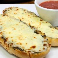 Garlic Cheese Bread · Topped with garlic butter and mozzarella cheese. Served with tomato sauce