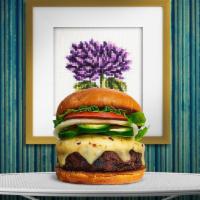 Hot Shot Peno Vegan Burger · Seasoned Beyond meat patty topped with melted vegan cheese, jalapenos, lettuce, tomato, onio...