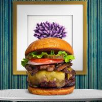 Shroomy Melt Vegan Burger · Seasoned Beyond meat patty topped with mushrooms, melted vegan cheese, lettuce, tomato, onio...