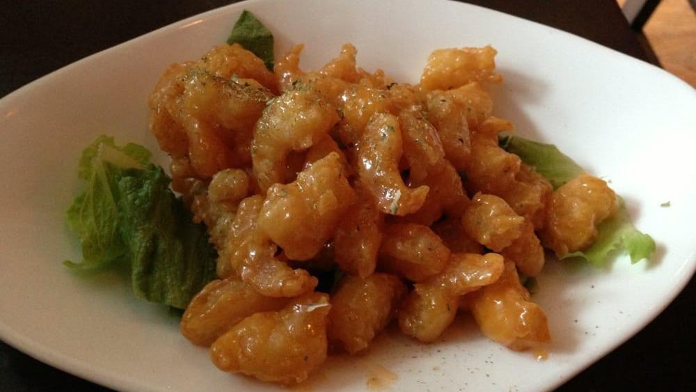 Popcorn Shrimp · gently fried shrimp with mildly spicy sauce.