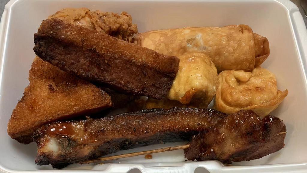 Pu Pu Platter For 2 · Egg roll, shrimp toast, spare ribs, chicken teriyaki, chicken wings & fried wonton.