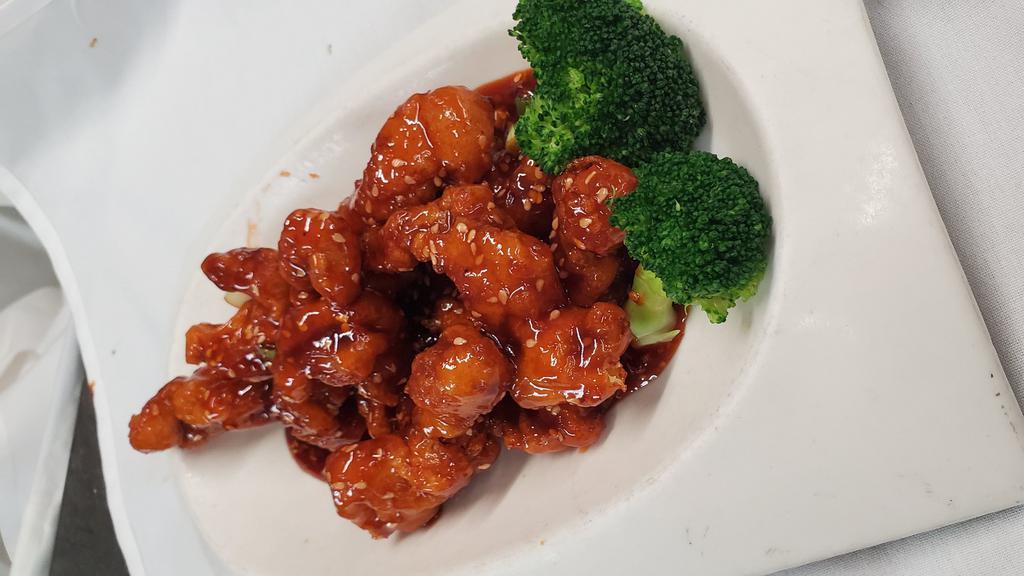Sesame Chicken · Served with a choice of brown or white rice.