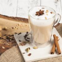 Chai Latte · A warm blend of black tea and a selection of rich spices with milk.