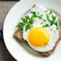 2 Sunny Side Up Eggs On A Roll · Farm fresh eggs served on a warm buttery roll.