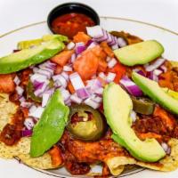 Nacho Dorado · Tortilla chips with chili con carne, jack & cheddar cheese, red onions, tomatoes, jalape os,...