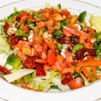 Mediterranean Salad (Gf) · Garden spring mixed with tomatoes, onions, peppers, sun-dried tomatoes, feta cheese & olives...