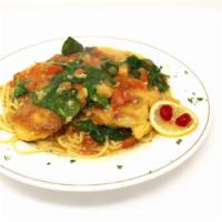 Lemon Chicken · Breaded chicken breast sautéed with tomatoes & spinach in a garlic butter lemon wine sauce. ...