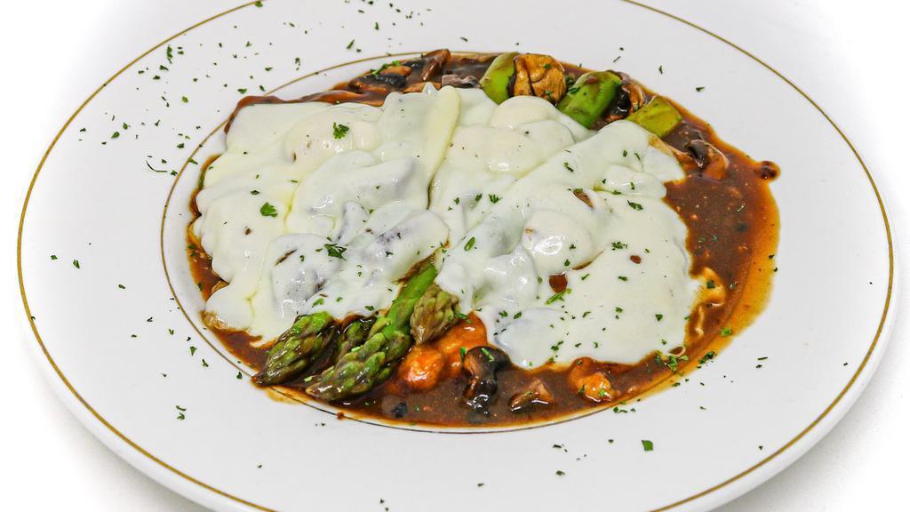Chicken Maderia · Chicken breast sautéed with mushrooms, asparagus in a madeira wine sauce & melted mozzarella cheese. Served with mashed potatoes
