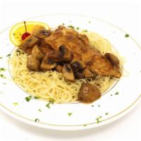 Chicken Marsala · Chicken breast sautéed with mushrooms in a marsala wine sauce. Served over linguine