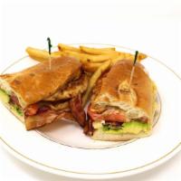 Avocado Chicken Club Sandwich · Grilled chicken breast, bacon, tomatoes, avocado, swiss cheese & mayonnaise. Served on a clu...
