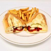 New York Grilled Chicken Sandwich · Grilled chicken breast with roasted peppers, sun-dried tomatoes and melted mozzarella cheese...