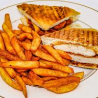 Usa Chicken Panini · Breaded chicken, bacon and American cheese panini in pressed focaccia bread served with Fren...