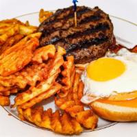 Chipotle Burger · 8 oz. Beef burger, bacon, red onions, fried egg, cheddar cheese & chipotle mayo. Served with...