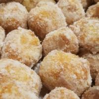 Zeppole (8) · Freshly prepared and made to order topped with powdered sugar.