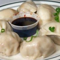 Dumpling · 8 pieces. Choice fried or boiled.