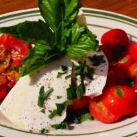 Burrata · Roasted red peppers, cherry tomato basil salad. Imported from Puglia.