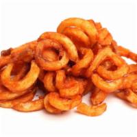 Curly Fries · Golden-brown seasoned curly fries.